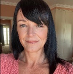 CAREY HEIDMANN