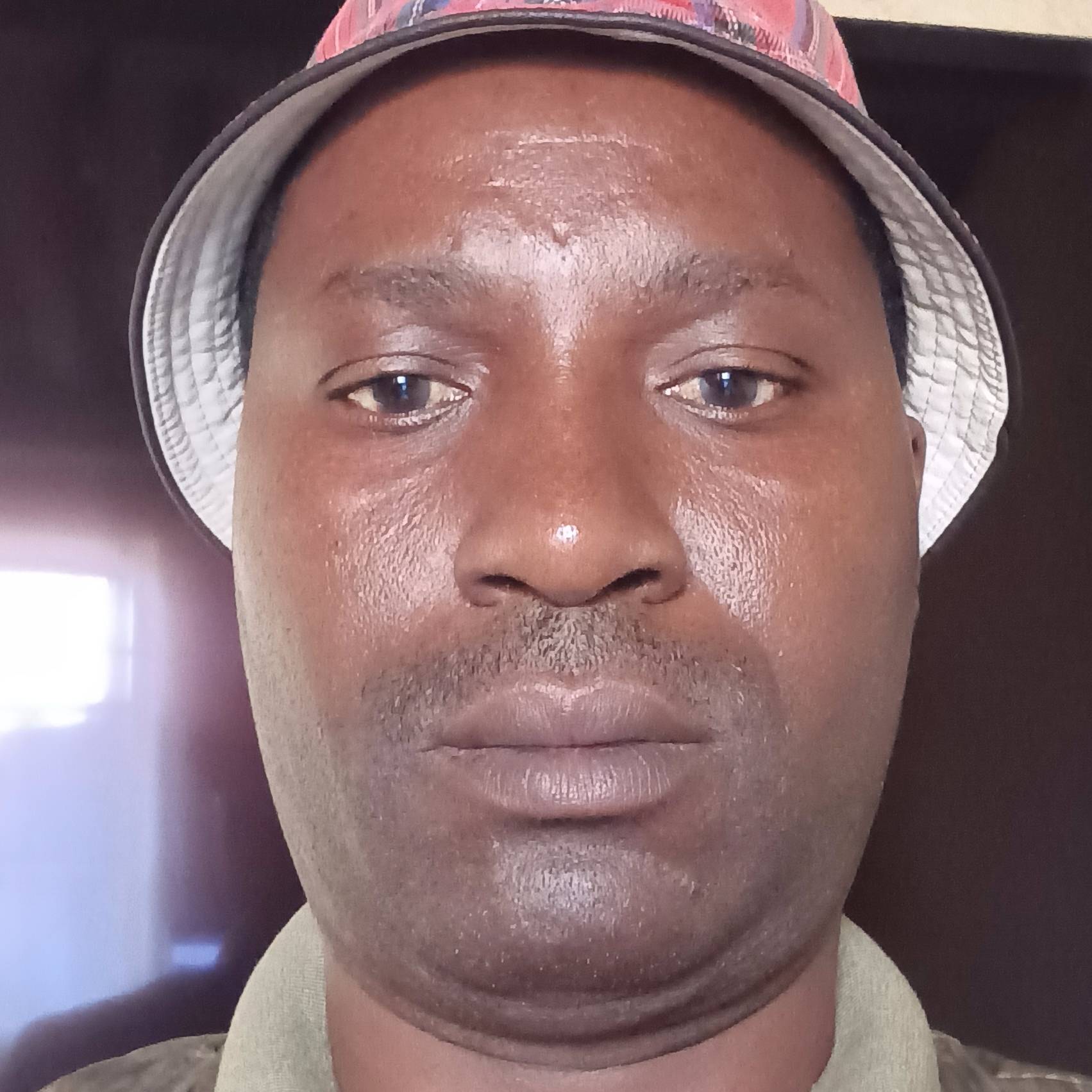 TONY ZWELIHLE NHLAPO